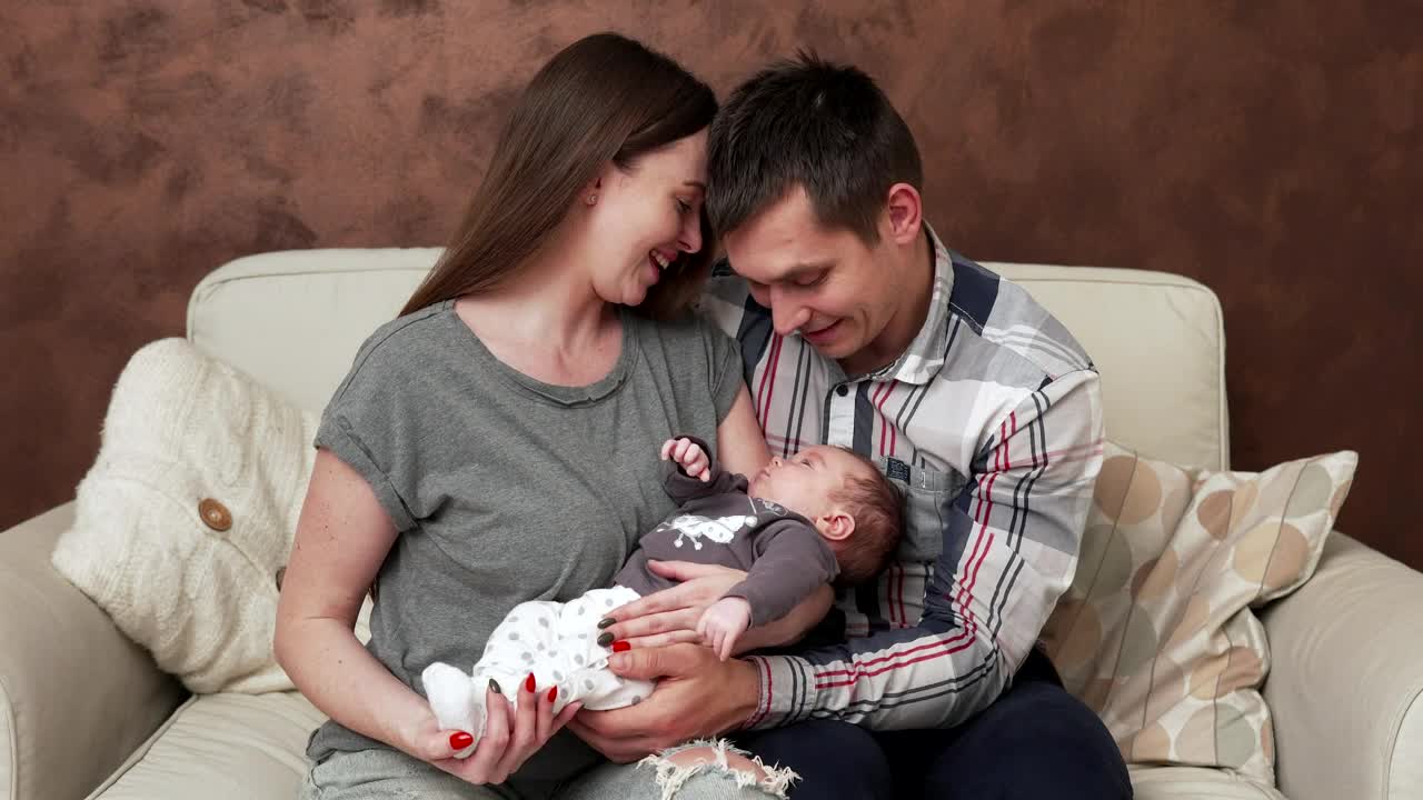 Stock Footage Young Couple With Their Newborn Live Wallpaper Free