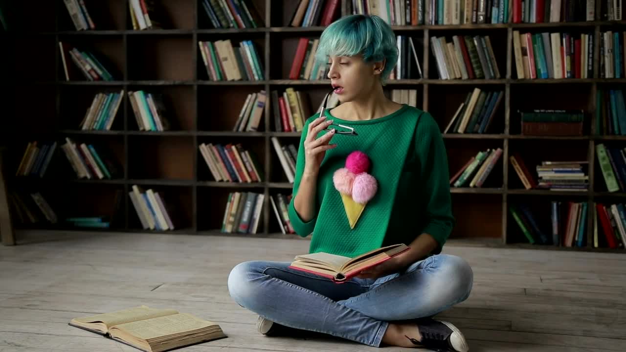 Stock Footage Woman Deep In Thought While Reading Live Wallpaper Free