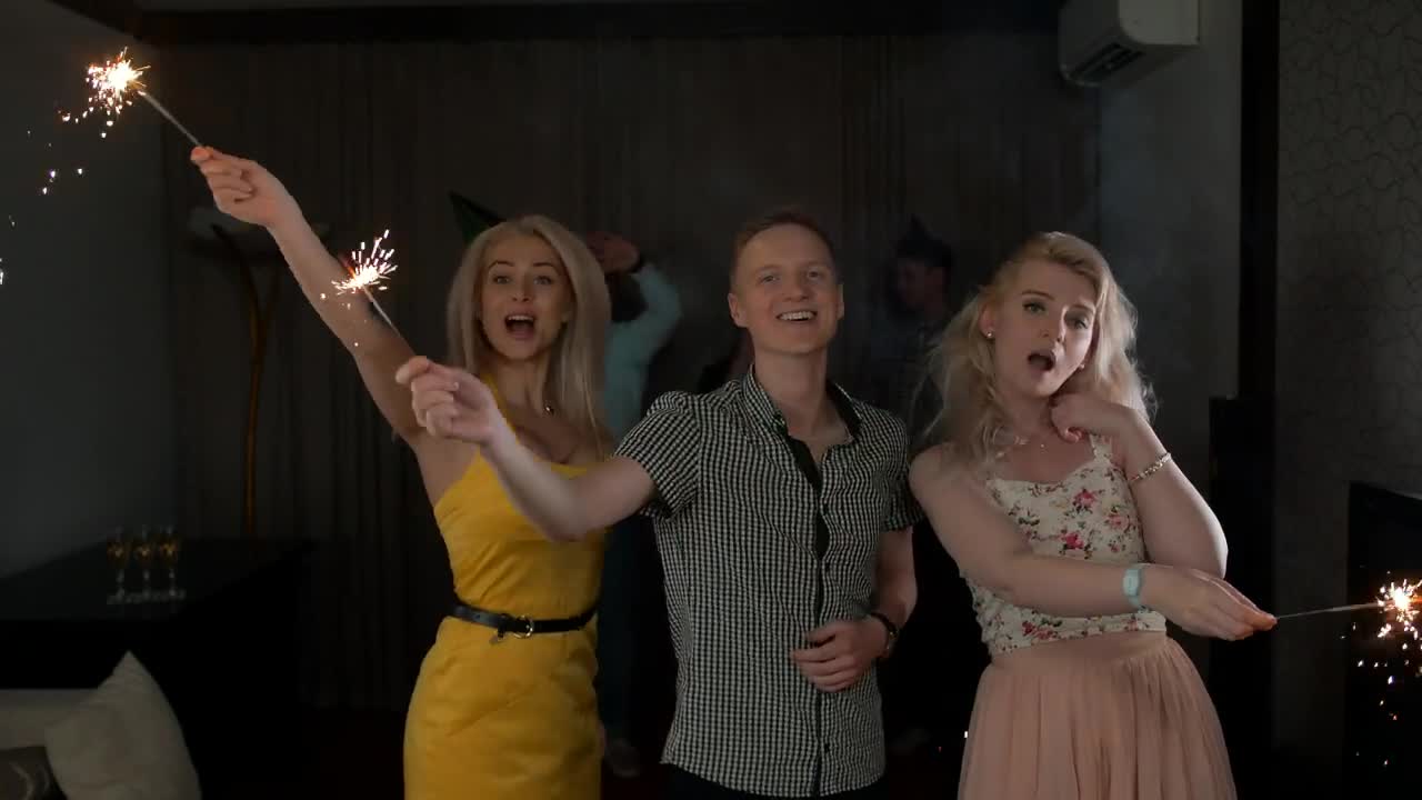 Stock Footage Young People Partying With Sparklers Live Wallpaper Free