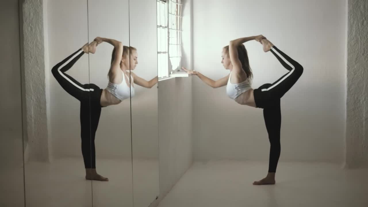 Stock Footage Woman In Front Of A Window Stretching Live Wallpaper Free